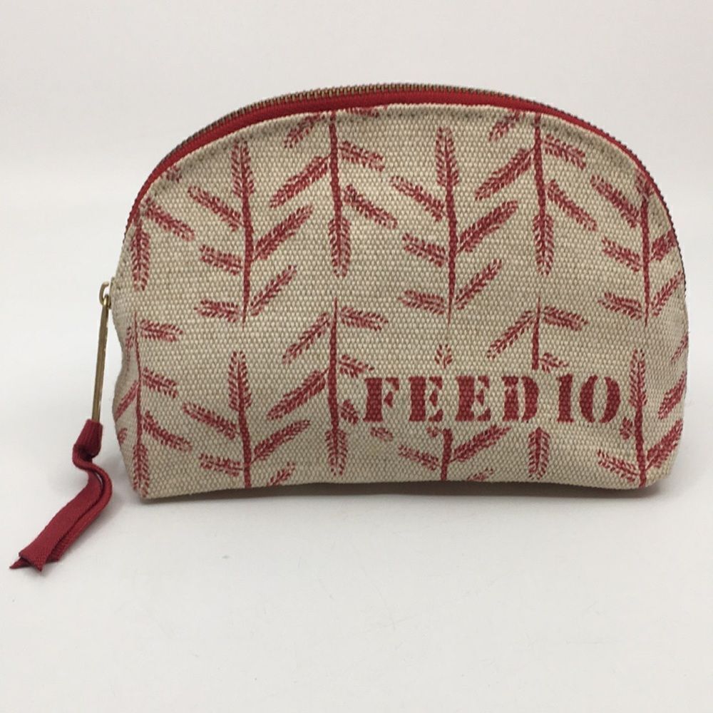 FEED 10 Clarins makeup cosmetics light tan and red carry-all pouch